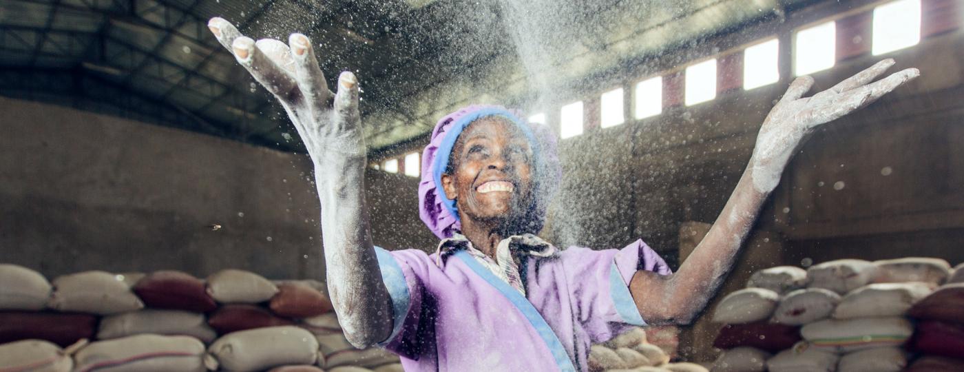 woman throwing flour